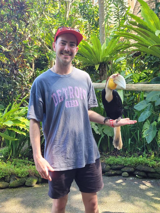 Matty Holdsworth with a tropical bird at the Don Antonio Blanco Museum.