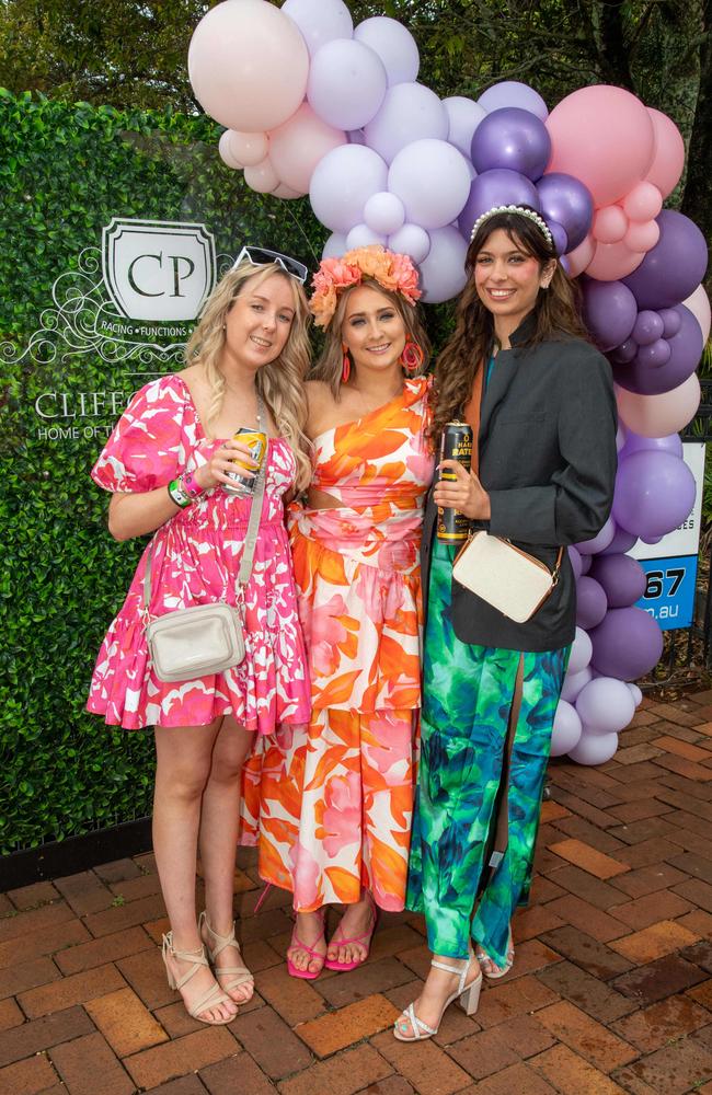 (From left) Lily Crighton, Amelia Sutton and Hayley Peters. Weetwood Raceday at Toowoomba Turf Club. Saturday, September 28, 2024. Picture: Nev Madsen.