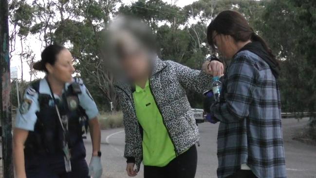 The couple were arrested at West Gosford on Thursday Credit: NSW Police screenshot