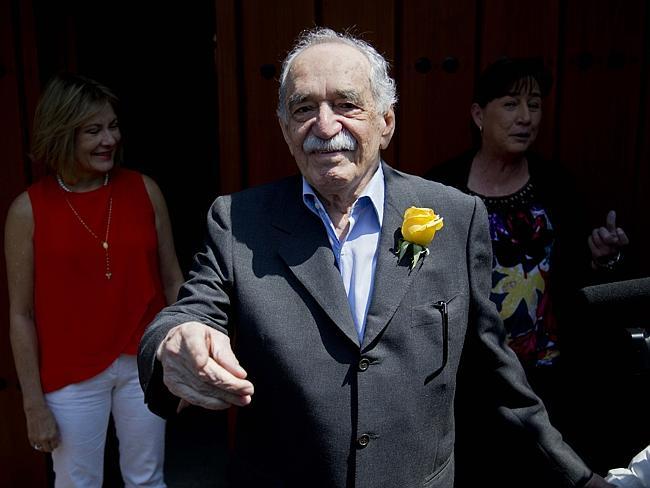 Birthday celebrations ... Garcia Marquez greets fans and reporters outside his home on his 87th birthday on March 6, 2014.