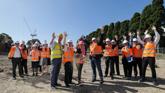 Those involved in the project celebrate the start of construction. Picture: George Salpigtidis