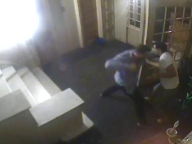 Foyer Area CCTV photo shows former NRL player Matthew Lodge assaulting Joseph Cartright after being let into an apartment building in New York City. Picture: Supplied