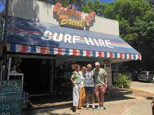 CLOSED: Paris Smith, Insa Rassau, Dennis Nancarrow and Golden Breed owner Nick Van de Merwe outside the iconic surf shop. Picture: Caitlin Zerafa