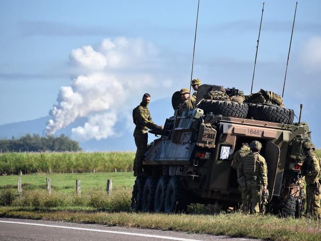 Australian Defence Force personnel in action during military exercises in North Queensland. Photograph: Cameron Bates