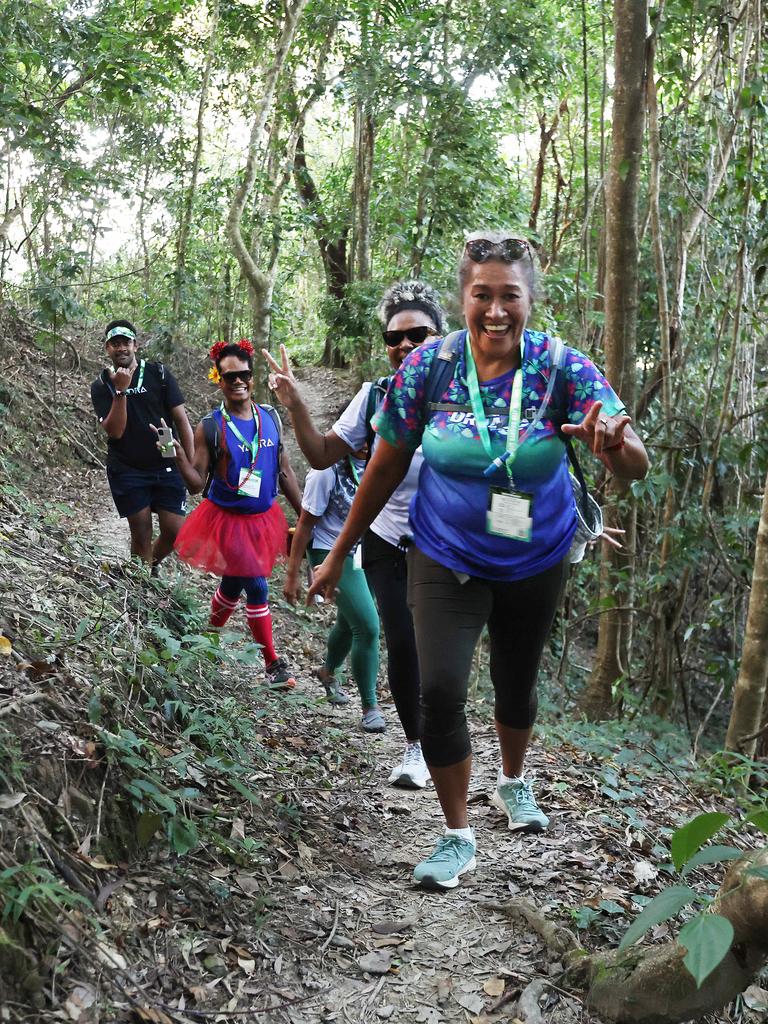 114 walkers and runners have raised more than $20,000 for the Far North Queensland Hospital Foundation in this year's BDO Arrow Experience, running and walking the arrow tracks on Mt Whitfield for charity. The proceeds from this year's event will go towards the purchase of a new surgical robot for the Cairns Hospital. Kami Radrodro, Maika Qalulu, Betty Tawake (obscured), Vanessa Tawake and Maureen Bolawaqatabu took on the long course together, walking the green, blue, red then yellow arrow tails in succession on Saturday morning. Picture: Brendan Radke