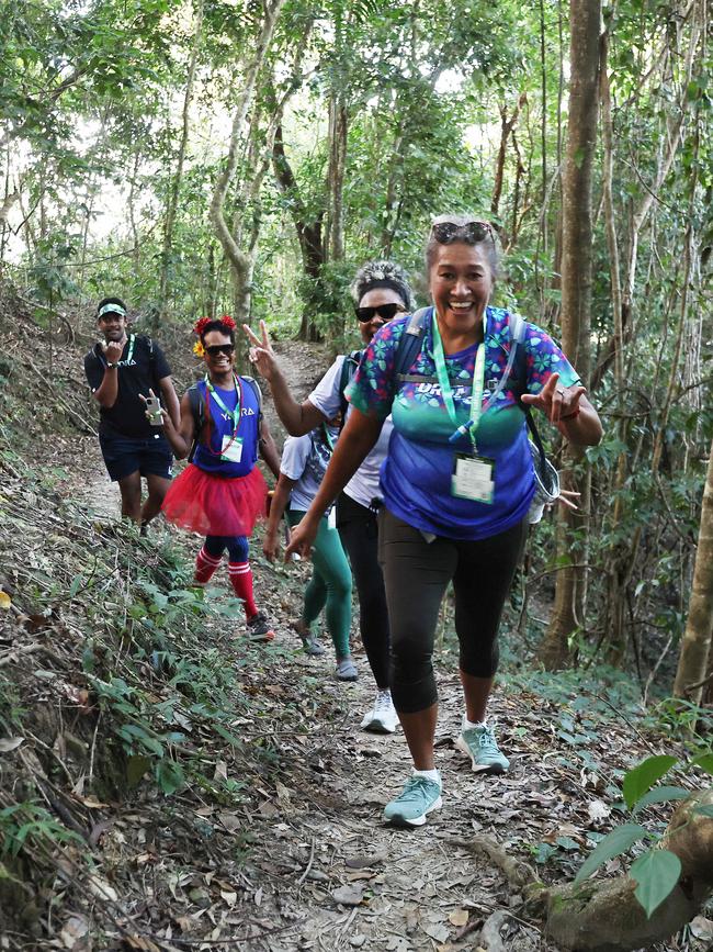 114 walkers and runners have raised more than $20,000 for the Far North Queensland Hospital Foundation in this year's BDO Arrow Experience, running and walking the arrow tracks on Mt Whitfield for charity. The proceeds from this year's event will go towards the purchase of a new surgical robot for the Cairns Hospital. Kami Radrodro, Maika Qalulu, Betty Tawake (obscured), Vanessa Tawake and Maureen Bolawaqatabu took on the long course together, walking the green, blue, red then yellow arrow tails in succession on Saturday morning. Picture: Brendan Radke