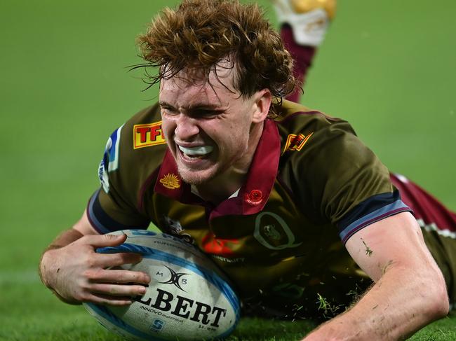 BRISBANE, AUSTRALIA - APRIL 27: Tim Ryan of the Reds scores a try during the round 10 Super Rugby Pacific match between Queensland Reds and Blues at Suncorp Stadium, on April 27, 2024, in Brisbane, Australia. (Photo by Albert Perez/Getty Images)