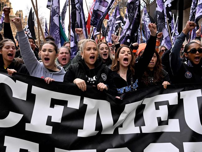 Tens of thousands of workers march after walking off work sites in protest against the forced administration of the construction arm of the CFMEU. Picture: AFP