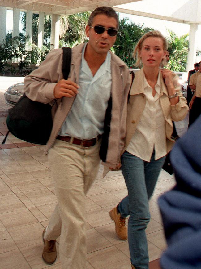 George Clooney with Celine Balitran meet the press.