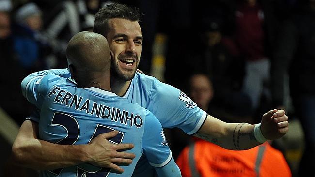 Manchester City's Spanish striker Alvaro Negredo opens the scoring. 