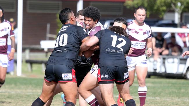 Action shots of the Burleigh Bears taking on Mudgeeraba Redbacks at Pizzey Park. Aston Bai tackled. 21 August Miami Picture by Richard Gosling