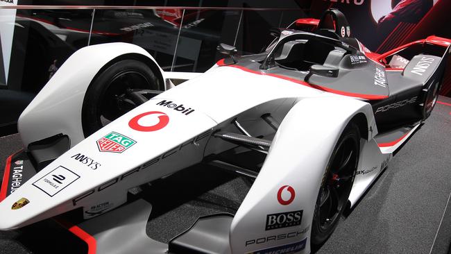 A Porsche Formula E race car at the company's booth at the International Auto Show in 2019.