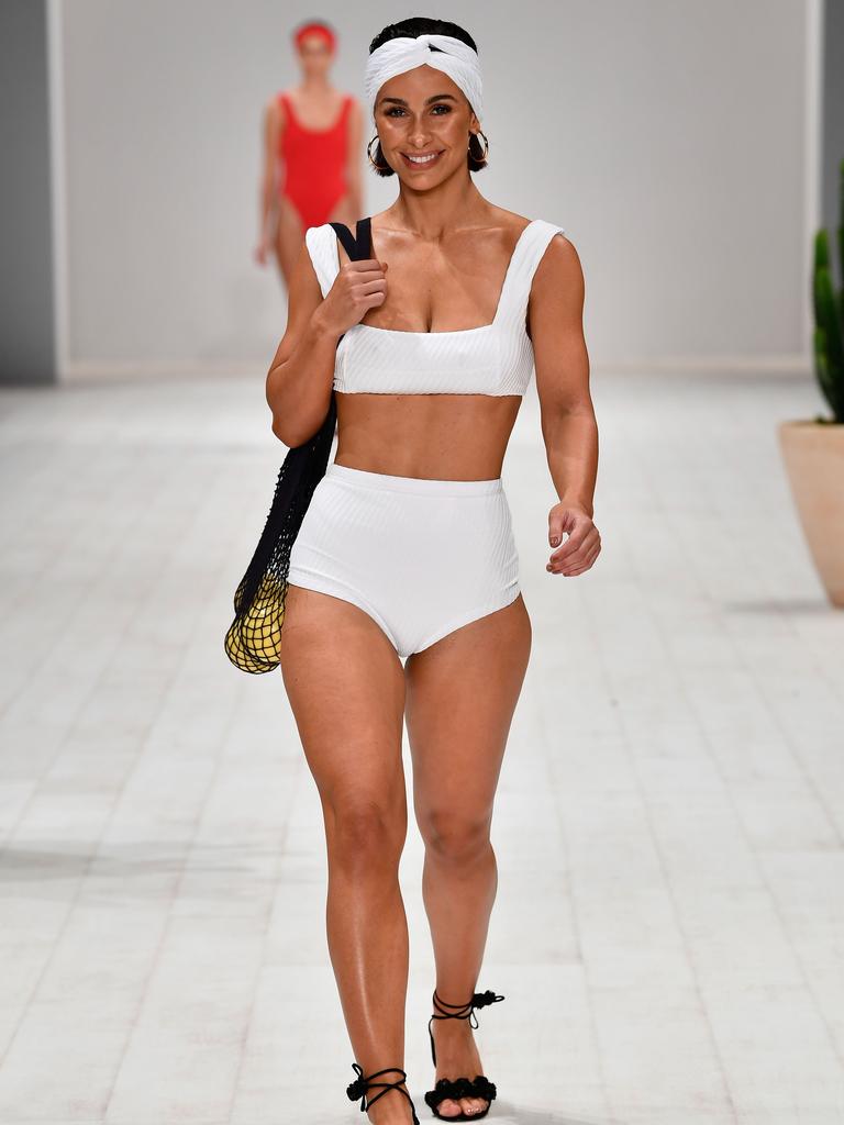 A model walks the runway in a design by Fella during the Swim show at Mercedes-Benz Fashion Week Resort 19 Collections at Carriageworks on May 14, 2018 in Sydney, Australia. (Photo by Stefan Gosatti/Getty Images)