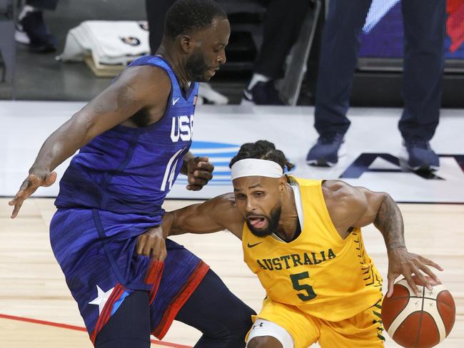 Patty Mills gets around Draymond Green in Australia’s victory over the USA in Las Vegas. . (Photo by Ethan Miller/Getty Images)