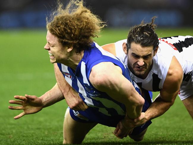 Brodie Grundy on Ben Brown, moments before impact. Picture: Getty Images