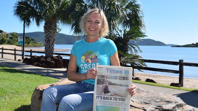 The Great Barrier Reef Festival was given a cash splash by the Federal Government this week. Pictured is Margie Murphy holding up her front page from when she was named Whitsunday Women in Business Community Champion, in 2015, for her services to the Great Barrier Reef Festival as chairwoman.