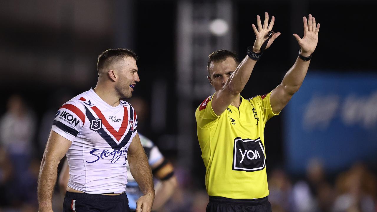 Referee Grant Atkins tells Roosters captain James Tedesco (L) that Brandon Smith is off to the bin. Picture: Getty