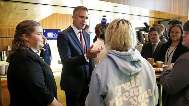 South Australian Premier Peter Malinauskas speaks with Summit Youth delegates L to R: Jamie Ferreira, Lua Pellegrini, Zoe Waterhouse-Bushnell and Alexander Wardrop at the Youth Breakfast, an opener for the Social Media Summit at ICC Darling Harbour Sydney. Picture: NewsWire / John Appleyard