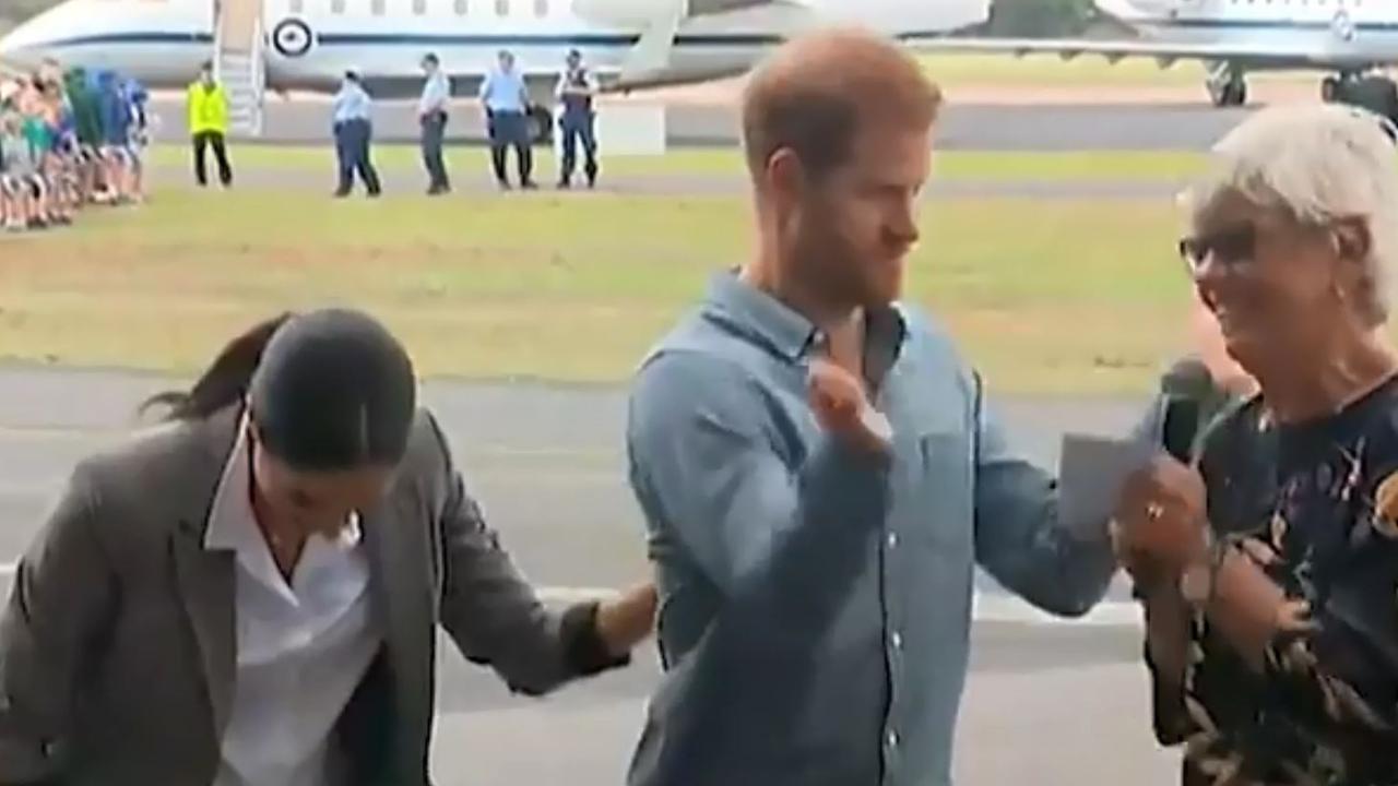 Harry even blows air on the poor lady’s face, but she doesn’t seem to mind.