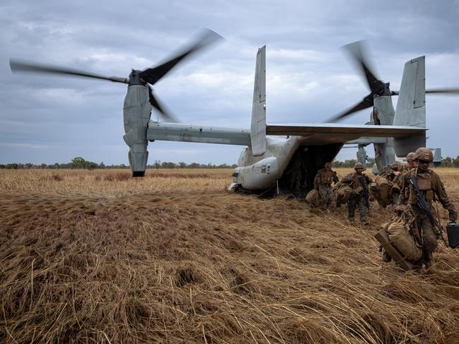 Marines from he United States Marine Corps, Marine Rotational Force - Darwin conducted training serials from RAAF Base Darwin to Bradshaw training area utilising MV-22 Osprey Aircraft. *** Local Caption *** U.S. Marines conduct advanced training in Northern Territory. The United States Marine Corps (USMC) recently conducted a rigorous training exercise at Bradshaw Field Training Area in the Northern Territory. Utilising MV-22 Osprey aircraft for transportation, the focus of the training was on Ground Threat Reaction for the Osprey crews. The Low Altitude Air Defense (LAAD) Platoon provided threat simulation, achieving valuable air defence training outcomes. Key equipment used included: **IR Training Serials:** - **UV GRIFFEN-50:** Australian Defence Force (ADF) equipment that simulates aircraft missile warning systems. - **Stinger Sim:** USMC's LAAD training equipment designed for target acquisition and lock exercises. - **Smokey Sam:** USMC equipment used to visually indicate missile launches to aircraft crews. Australian training areas and equipment allow the USMC to achieve training outcomes that are very difficult to replicate elsewhere. This exercise was also noted as a particularly valuable training exercise for the LAAD Platoon, highlighting the significant mutual training benefit of integrated Ground Threat Reaction training activities for both ground forces and aircrew.