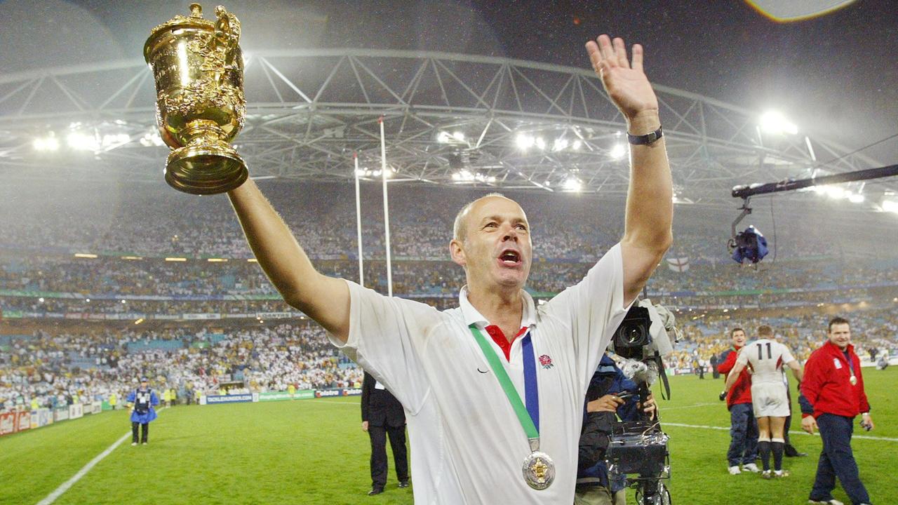 England coach Clive Woodward holds the Webb Ellis Cup after beating Australia.