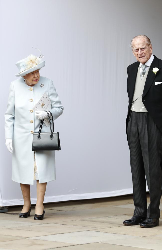 The Queen dressed to match this wall, and refused to accessorise her outfit with a smile for the entire day. Prince Phillip just looked happy to be alive.