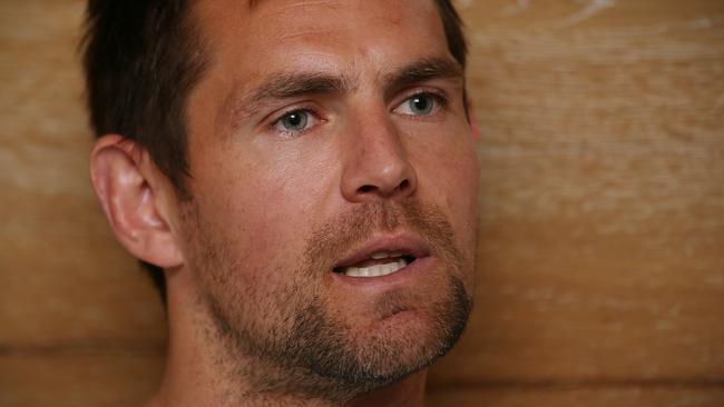 Luke Hodge speaks to Mark Robinson. Picture: Wayne Ludbey