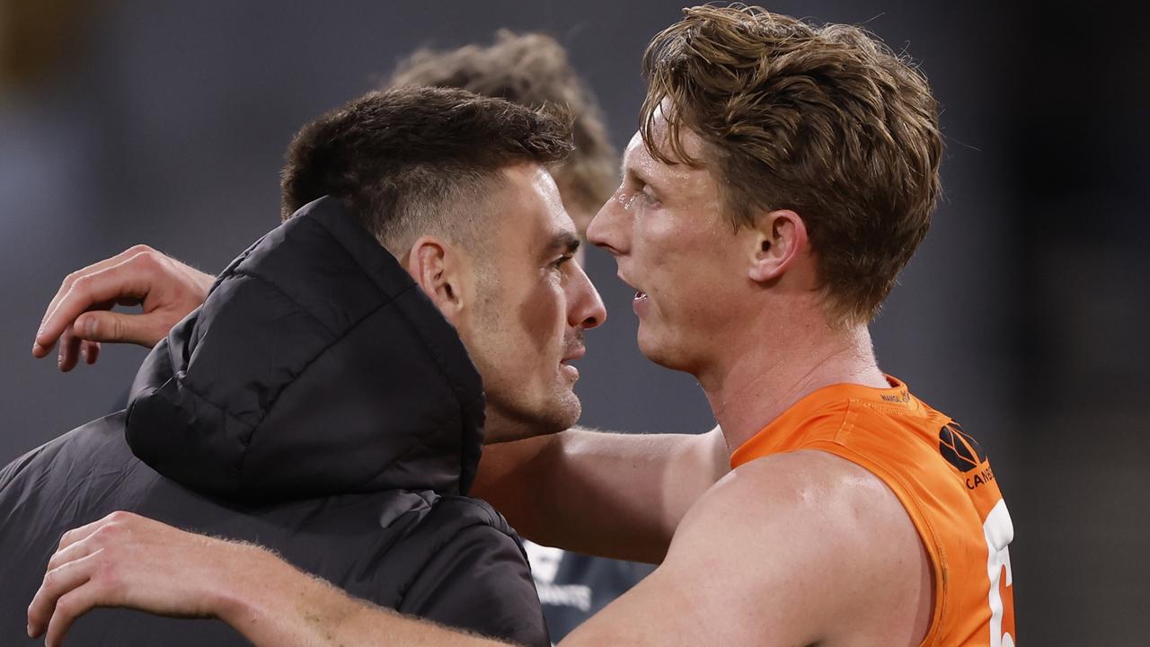 GWS star Stephen Coniglio (left) is expected to return against Hawthorn next week, but Josh Kelly will remain sidelined for at least one more game with a calf injury. Picture: Darrian Traynor / Getty Images