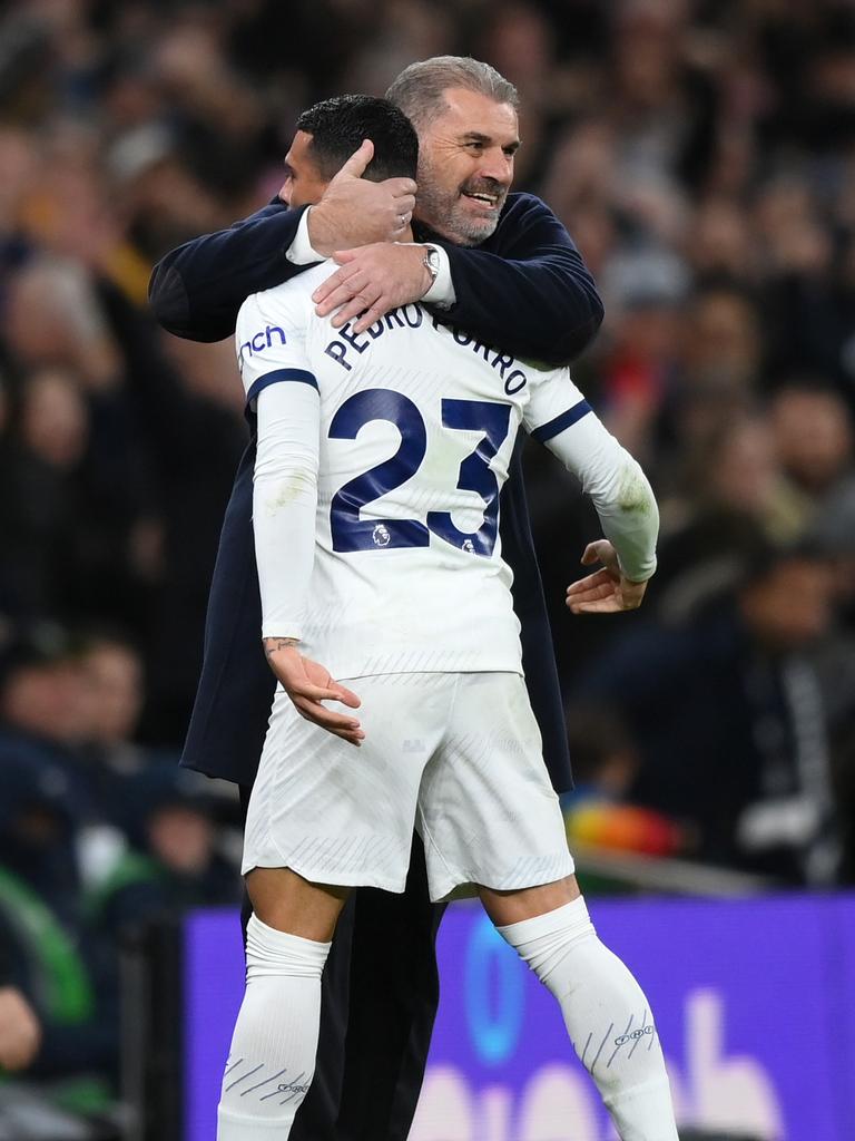 Ange Postecoglou embraces Pedro Porro after teammate Richarlison (not pictured) scores their team's third goal. Photo by Justin Setterfield/Getty Images.