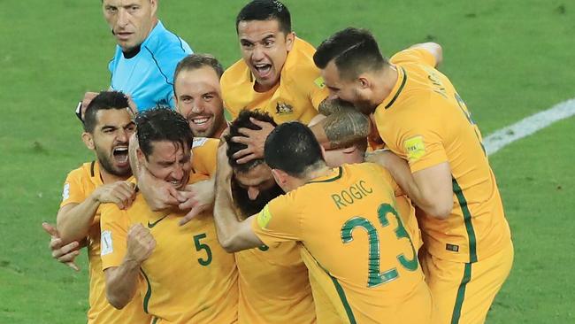 The Socceroos celebrate another famous night. (Photo by Mark Evans/Getty Images)