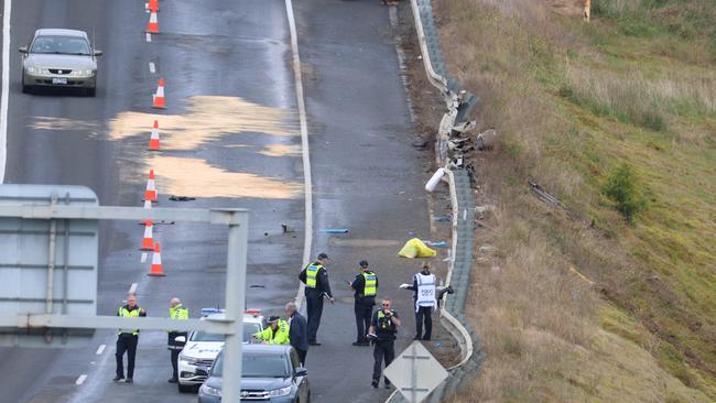 Damaged road barriers that the bus broke through in the crash. Picture: Brendan Beckett