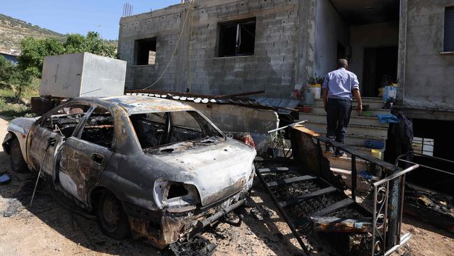 The aftermath of the attack by Israeli settlers in the village of Mughayir near Ramallah on the West Bank. Picture: AFP