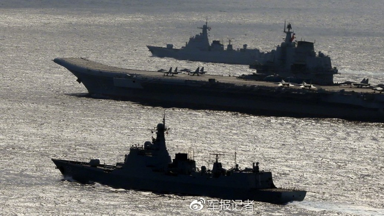 China's aircraft carrier Liaoning, with a close escort of two destroyers. Such mobile airfields would be well positioned to reinforce Beijing's 'unsinkable' island airfields if the need arises. Picture: PLA