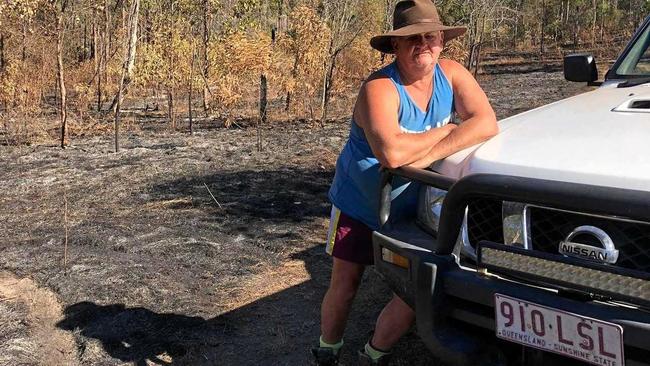 BURNT OUT: Barry Collins on his Boyne Valley property 'Bow River' after a recent bush fire