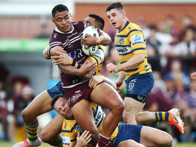 Sea Egale Manase Fainu is tackled by the Eels during a match in July this year. Picture: AAP