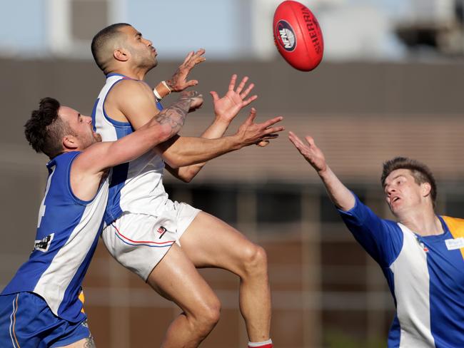 Ahmed Saad flies for a mark in West Preston-Lakeside’s grand final victory over Macleod.