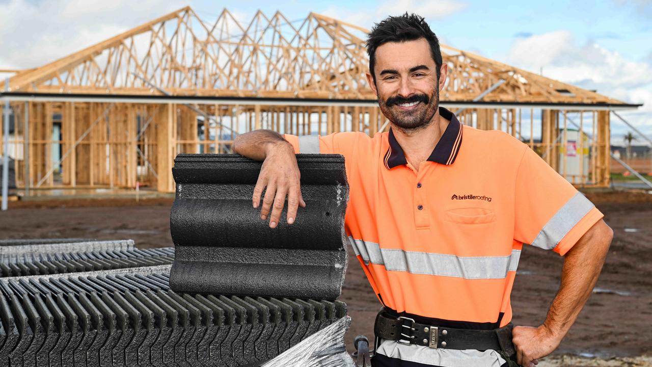 Roof tiler Mat Kennett working at Riverlea Park. Picture: Brenton Edwards