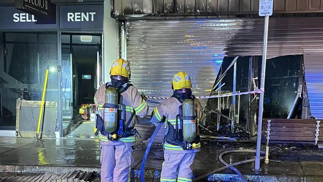 Firefighters at the scene of a tobacco shop blaze in Melbourne, which is linked to gangland activity. Picture: Epping CFA