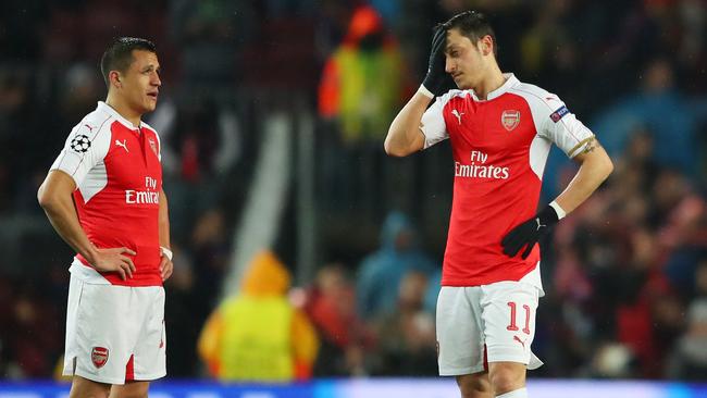 Alexis Sanchez (L) and Mesut Ozil (R) of Arsenal.