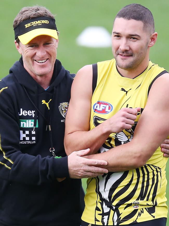 Grigg shares a laugh with coach Damien Hardwick. Picture: Getty Images