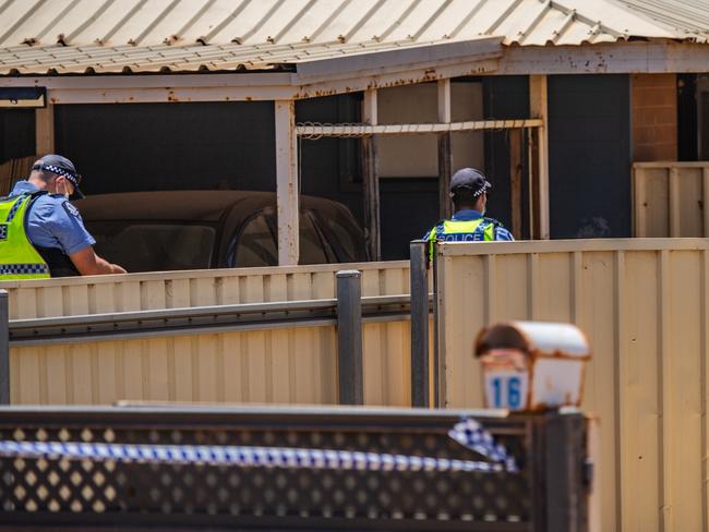 Forensics and masked police search 18a Tonkin Cresent in Carnarvon, the place where Cleo Smith believed to have spent the 18 days she was missing. Picture: Kelsey Reid/The West Australian