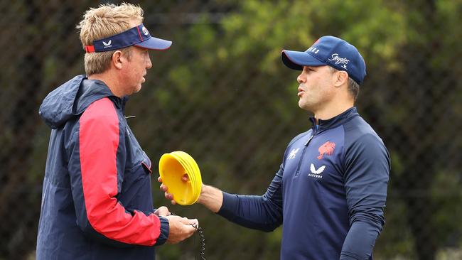 Roosters head coach Trent Robinson speaks to Cooper Cronk. Picture: Getty