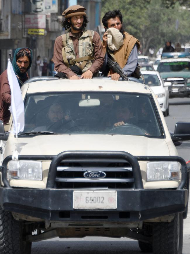 Taliban fighters patrol on a vehicle along a road in Kabul. Picture: Hoshang Hashimi/AFP