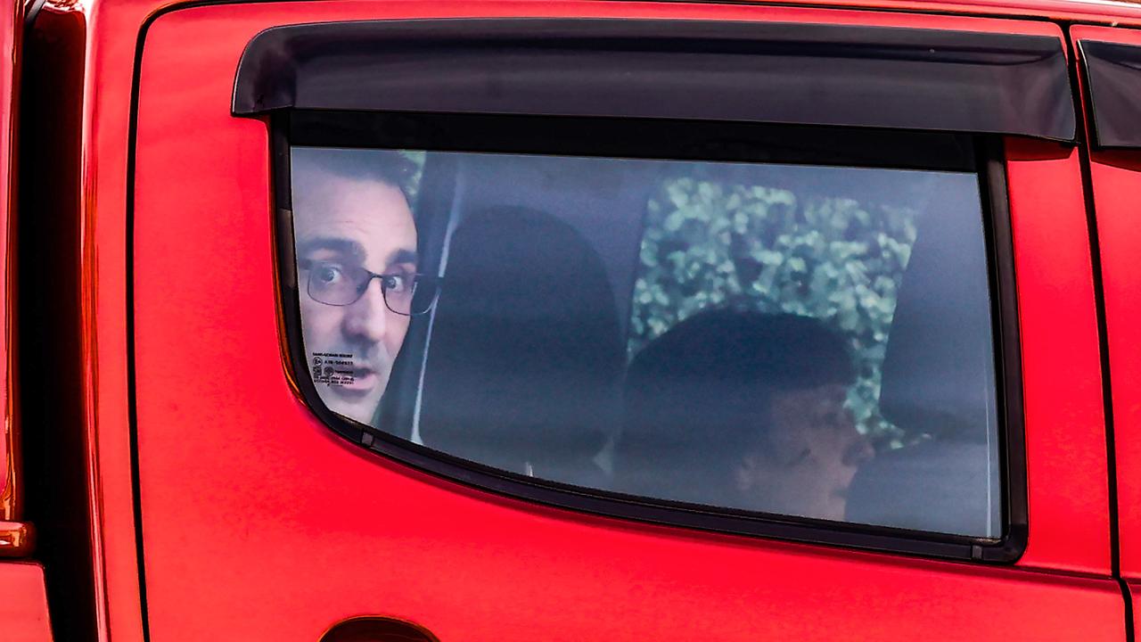 Roberts arriving at a home in Melbourne’s southeast. Picture: David Caird