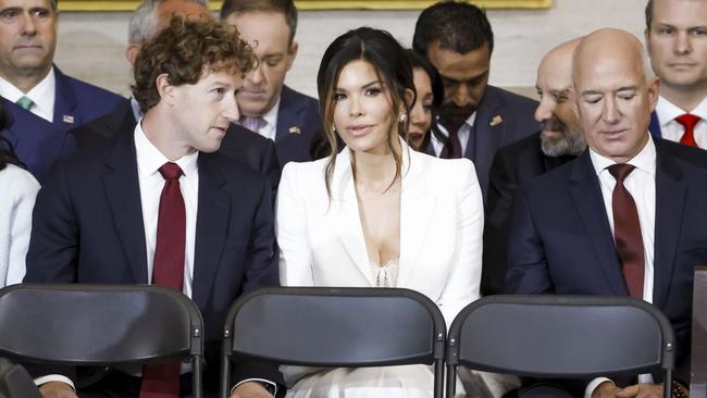 Meta CEO Mark Zuckerberg, left, Lauren Sanchez, and Amazon CEO Jeff Bezos. Picture: Getty Images