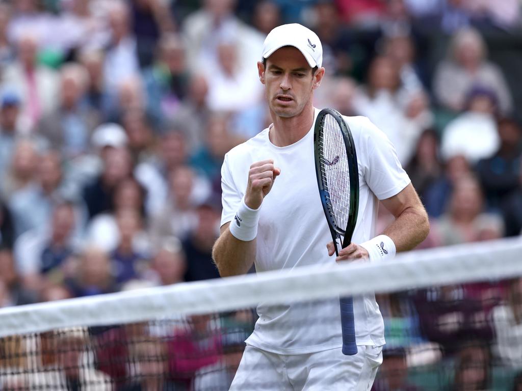 Andy Murray reacts during a doubles game with brother Jamie at Wimbledon. Picture: Getty Images