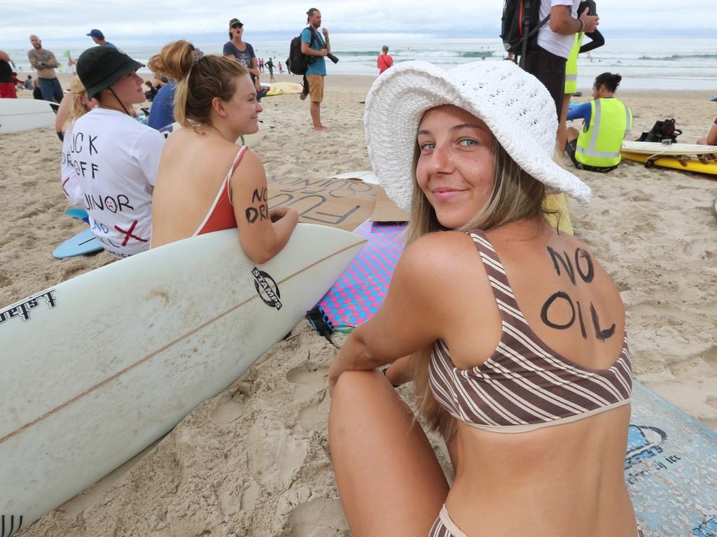 Protest at Burleigh against an oil company drilling in the Great Australian Bight. Elise Milner of Byron Bay (white Hat). Pic Mike Batterham.