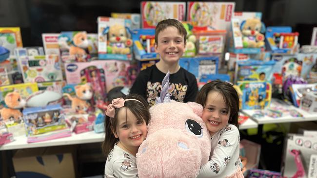 Zach and his sisters Lilly and Annalise have supported kids in care for two years. Picture: Julia Kanapathippillai