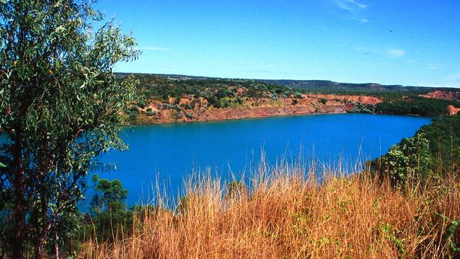 06 Jul 2004. Pine Creek, NT - former Enterprise mining Pit is now transformed into a lake. scenic travel history