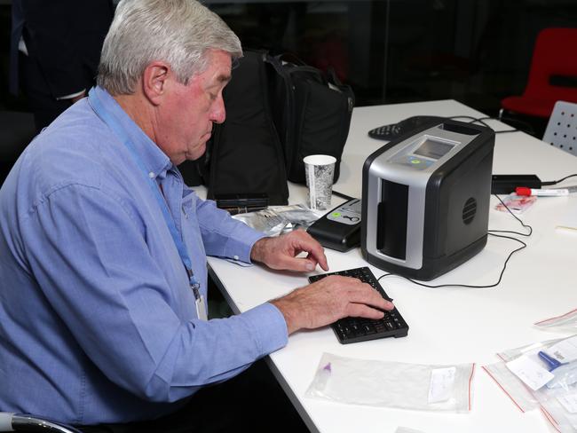 Integrity Sampling NSW managing director Ian Jameson with the drug tests performed with samples from Sydney Fashion Week on May 16. Picture: Christian Gilles